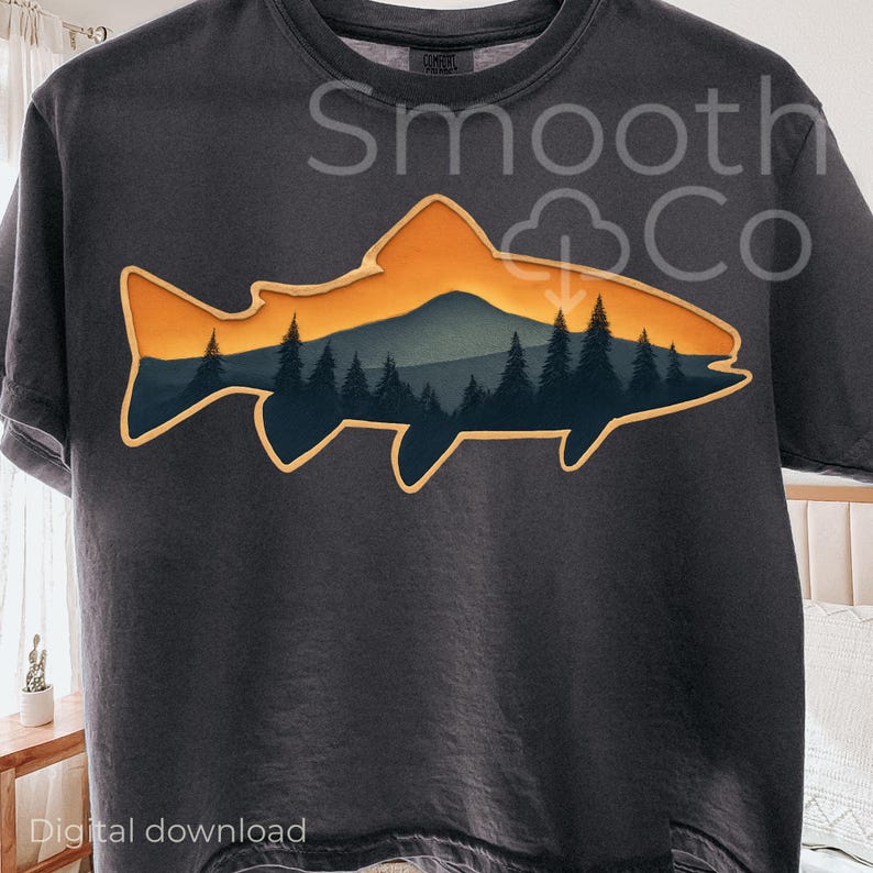 May include: Dark gray t-shirt featuring a fish-shaped graphic with a mountain and forest scene in shades of orange, blue, and green. The text "Smooth Co" is printed above the graphic. The words "Digital download" are printed at the bottom.