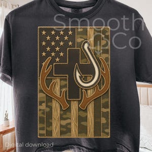 Peut inclure: T-shirt gris foncé avec un motif patriotique. Le motif comprend un drapeau américain avec une croix, un hameçon et des bois de cerf. Les mots "Téléchargement numérique" sont en bas.