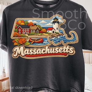 May include: Dark gray t-shirt featuring a detailed embroidered design of the Massachusetts state outline. The design includes a lighthouse, houses, a boat, and the word "Massachusetts" in a decorative font. The shirt also has the text "Smooth Co" and "Digital download".