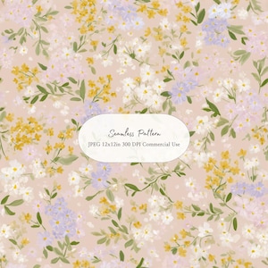 May include: A seamless floral pattern with yellow, white, and lilac flowers and green leaves on a pale pink backdrop. The text "Seamless Pattern" is displayed in a white oval.