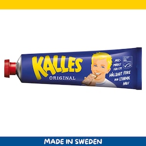 May include: A tube of Kalles Original fish roe spread. The blue tube has yellow text that reads "KALLES ORIGINAL". A cartoon boy is eating a sandwich. The tube has a red cap and the text "MADE IN SWEDEN" is at the bottom.