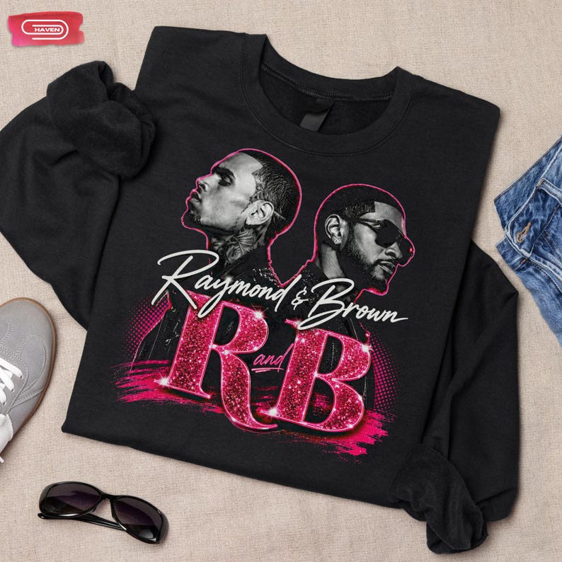 A promotional graphic featuring singers Chris Brown and Usher back-to-back, with the text "Raymond & Brown R and B" in sparkly pink and white lettering against a dark geometric background.