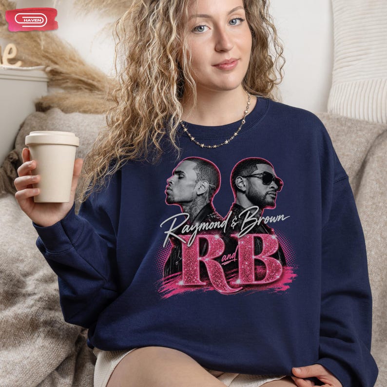 A promotional graphic featuring singers Chris Brown and Usher back-to-back, with the text "Raymond & Brown R and B" in sparkly pink and white lettering against a dark geometric background.