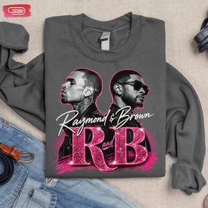 A promotional graphic featuring singers Chris Brown and Usher back-to-back, with the text "Raymond & Brown R and B" in sparkly pink and white lettering against a dark geometric background.