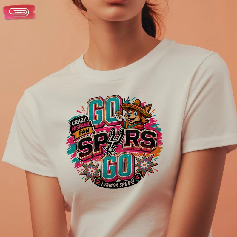 Colorful retro-style San Antonio Spurs basketball graphic featuring a coyote mascot wearing a sombrero, with bold 3D text reading Crazy Hispanic Fan, Go Spurs Go, and ¡Vamos Spurs! in neon pink, teal, and orange on a black background.
