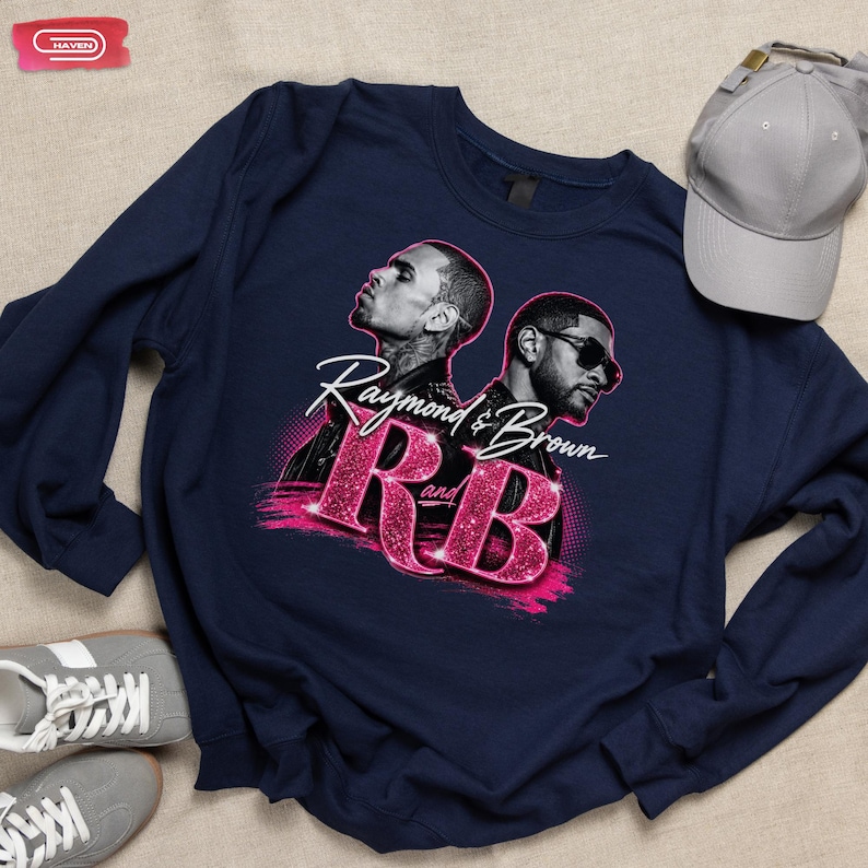 A promotional graphic featuring singers Chris Brown and Usher back-to-back, with the text "Raymond & Brown R and B" in sparkly pink and white lettering against a dark geometric background.