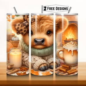 May include: A tumbler featuring a cozy autumn design. The design includes a brown cow with a bow, a mug of whipped cream, a fireplace, candles, pumpkins, and the text "2 FREE DESIGNS".