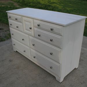 X8421A Hardwood 8 Drawer Dresser, Overlap Drawers, Flat Panels, one door, 54 wide x 20 deep x 36 tall natural color image 2