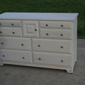 X8421A Hardwood 8 Drawer Dresser, Overlap Drawers, Flat Panels, one door, 54 wide x 20 deep x 36 tall natural color image 1