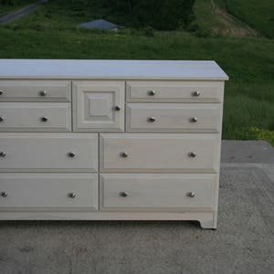 X8421A Hardwood 8 Drawer Dresser, Overlap Drawers, Flat Panels, one door, 54 wide x 20 deep x 36 tall natural color image 3