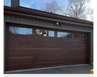Contemporary Wood/Aluminum Garage Door with 4 windows on the top with the color as the picture for Warren.
