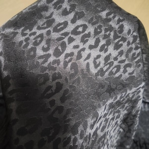 High Quality Black Leopard Jacquard Fabric: Thin, Smooth , 47" Wide
