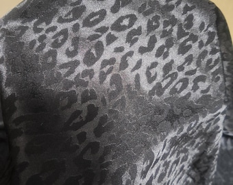 High Quality Black Leopard Jacquard Fabric: Thin, Smooth , 47" Wide