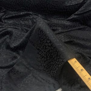 Black Leopard Jacquard Fabric: Thin, Smooth Polyester, 47&quot; Wide