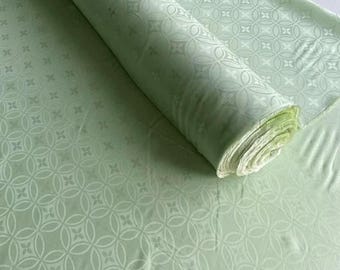 Silk Jacquard Fabric With Light Green:Four leaf copper coin pattern 22mm silk fabric New Chinese clothing Hanfu Qipao top fabric