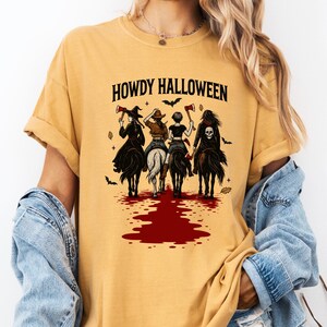 Howdy Halloween Cowgirl Witch Shirt: Western Spooky Season Tee