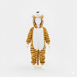 May include: A child's tiger costume. The one-piece outfit is yellow with black stripes and a white belly. The hood features a tiger face with ears and a black nose. The costume has a zipper closure and is designed to resemble a tiger.
