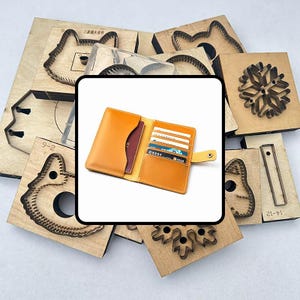 May include: An open, tan leather wallet with multiple card slots and a passport compartment. The wallet is surrounded by various wooden die-cut shapes, including animal and snowflake designs, used for crafting.