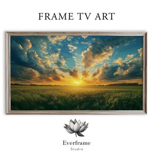 May include: A framed landscape art print featuring a vibrant sunset over a wheat field. The sky is filled with dramatic clouds, and the text "FRAME TV ART" is at the top. The artwork is from Everframe Studio.