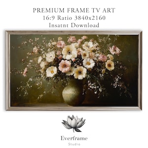以下が含まれることがあります： フレームTV用デジタルアート。緑の花瓶に生けられた白とピンクの花の静物画。テキスト：PREMIUM FRAME TV ART, 16:9 Ratio 3840x2160, Insatnt Download。下部には蓮のアイコンとEverframe Studioの文字。