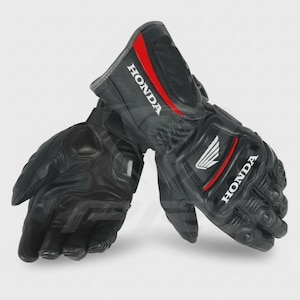 May include: Black leather motorcycle gloves featuring the Honda logo in white and red. The gloves have reinforced padding on the knuckles and palms. Designed for protection and grip, these gloves are a practical accessory.