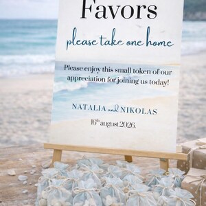 Ocean wedding signs bundle featuring a coordinated set of 13 printable ceremony and reception signs, including welcome sign, seating chart, timeline, bar signs, guest book, cards and gifts, favors, reserved, unplugged ceremony, and table numbers. Soft blue ocean background with elegant coastal typography creates a romantic beach and destination wedding look. Fully editable in Canva and available in multiple sizes, perfect for seaside, coastal, and tropical weddings.