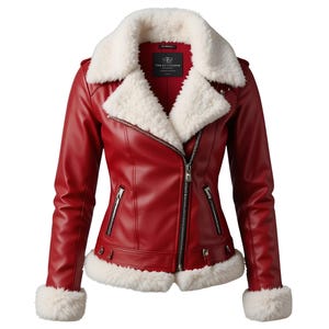 May include: A red faux leather jacket with a white faux fur collar, cuffs, and lining. The jacket features a diagonal zip closure, two zipped pockets, and decorative buckles. The jacket has a classic biker style.