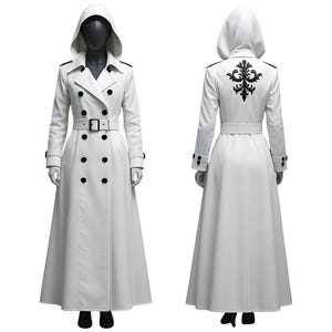 May include: A long, white hooded coat with a double-breasted front, black buttons, and a belt. The back features a black decorative emblem. The coat is displayed on a mannequin.