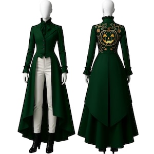 May include: A dark green long coat with a high-low hemline, paired with white pants and black boots. The coat features a notched lapel, a decorative bow, and a pumpkin design on the back. The coat is displayed on a mannequin.