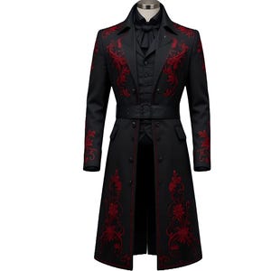 Puede incluir: Abrigo largo negro con bordados florales rojos. El abrigo presenta un cuello con muescas, una cintura con cinturón y una parte delantera abotonada. Las mangas y los paneles frontales están adornados con intrincados diseños florales rojos. El abrigo se muestra en un maniquí.