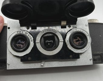 Cámara de cine estéreo realista vintage de 35 mm David White, imágenes estereoscópicas 3D con estuche.