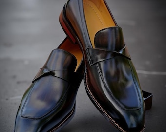 Handgjorda svarta patina penny loafers