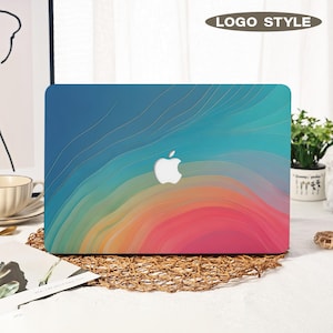 May include: A white ceramic mug with a black handle and the text "But First, Coffee" in a bold, black font. The mug is set against a blurred background, suggesting a cozy setting.