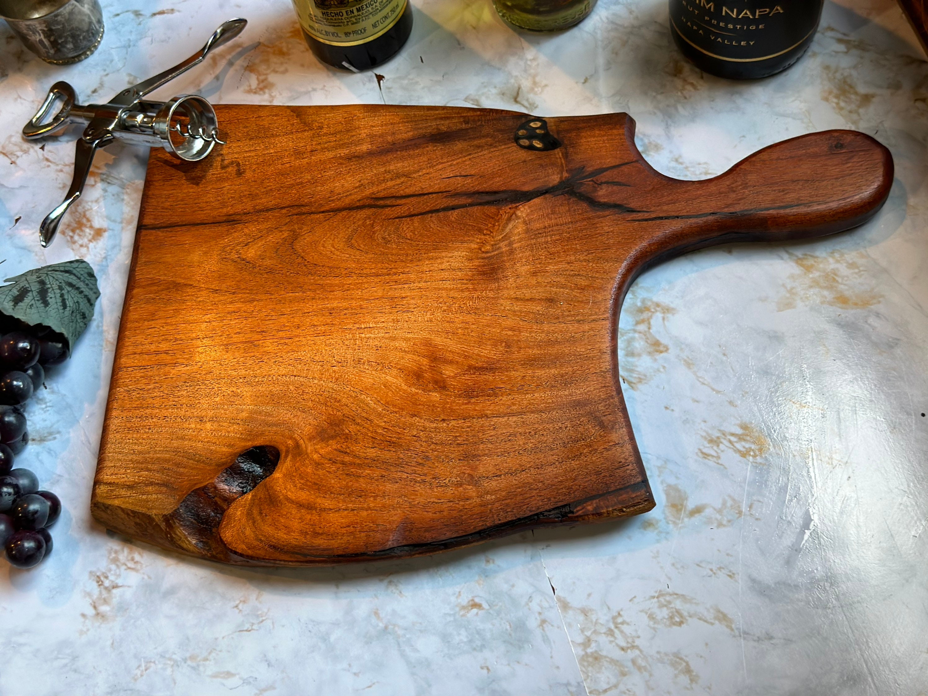 Handle cutting board made from ok Chilean mesquite butcher knife shape