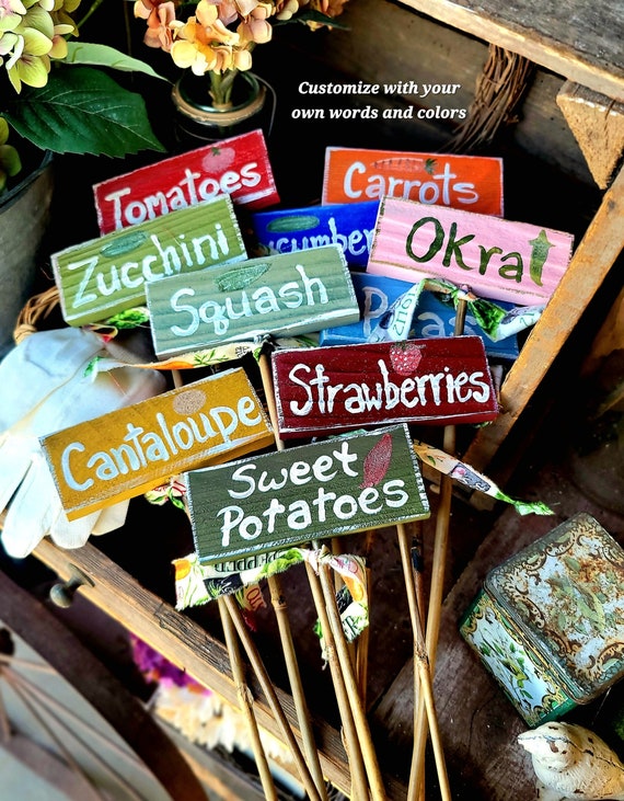 23" garden stakes. You choose the color,image and up to two handpainted words. Weatherproof and perfect for vegetable and herb gardens