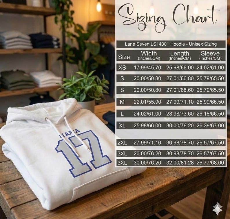 Puede incluir: Una sudadera con capucha unisex blanca con la palabra "MAFIA" y el n&uacute;mero "17" en azul. La imagen incluye una tabla de tallas con medidas en pulgadas y cent&iacute;metros para las tallas XS, S, M, L, XL, 2XL y 3XL.