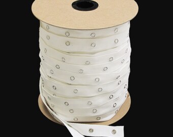Snap Tape: 12 Ligne Snaps; 3/4" wide Cotton Tape; 1" Spacing - 1 Yard