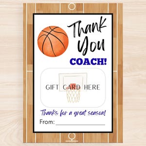 May include: A basketball-themed gift card holder with a basketball graphic and the words "Thank You COACH!" in black and blue. The design includes a space for a gift card and the text "Thanks for a great season!"