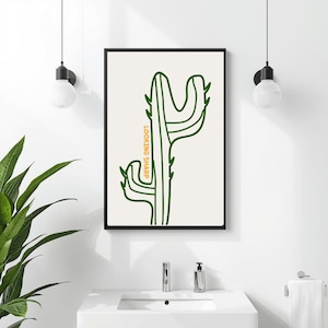 May include: A set of three ceramic mugs with a speckled, matte finish. The mugs are in shades of cream, light gray, and dark gray. Each mug has a simple, modern design and a rounded handle. Perfect for coffee or tea.