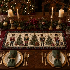 May include: A rectangular quilted table runner featuring a repeating pattern of nutcracker figures, decorated Christmas trees, and wrapped gift boxes. The runner has a dark border with small gingerbread men and is centered on a wooden table.