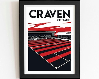 May include: A framed art print featuring a stylized illustration of Craven Cottage stadium. The graphic displays the text CRAVEN COTTAGE at the top, with a red and black striped soccer field and stadium stands in a bold, high-contrast color palette.