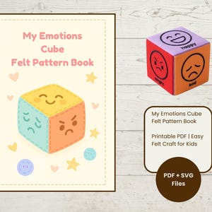 May include: A felt pattern book titled "My Emotions Cube" with a colorful cube illustration. The cube shows different emotions on each side. A separate felt cube with "happy", "angry", and "sad" faces is also shown.
