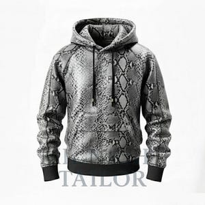 May include: A hooded sweatshirt with a snakeskin pattern in shades of gray and black. The hoodie features a kangaroo pocket, black drawstrings, and black ribbed cuffs and hem. The word "TAILOR" is visible at the bottom.
