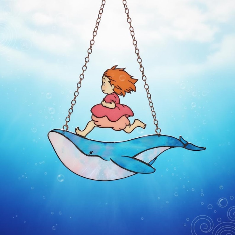 May include: A charming stained glass artwork depicting a girl with red hair running on a blue whale, suspended by chains. The background is a blue gradient with bubbles, evoking an underwater atmosphere.