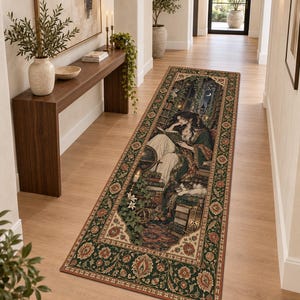 May include: A long rectangular runner rug featuring a dark green border with intricate floral patterns in red, orange, and cream. The center depicts a detailed illustration of a person reading a book surrounded by stacks of books, a cat, and plants.