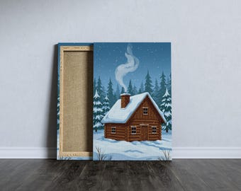 May include: A canvas print depicting a cozy cabin in a snowy winter scene. The brown log cabin has a snow-covered roof and a chimney with smoke rising into the blue sky. Evergreen trees and falling snow complete the winter landscape.