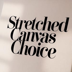 a white canvas with black lettering that reads stretched canvass choice