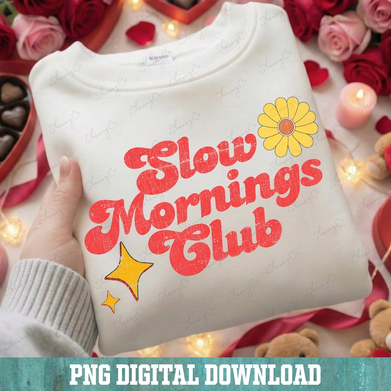 Red wavy text Slow Mornings Club design with yellow daisy flower accent, vintage distressed look digital art for print on demand products.
