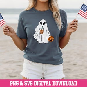 May include: A slate blue t-shirt with a cartoon ghost holding a drink and a jack-o'-lantern. The ghost has black oval eyes. The shirt has the text "PNG & SVG DIGITAL DOWNLOAD" at the bottom.