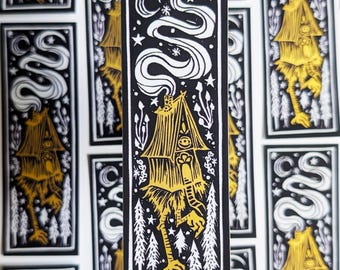 Baba Yaga Linocut-style Sticker | metallic gold matte vinyl